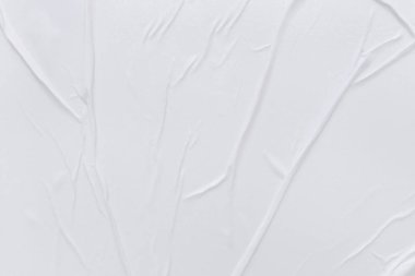 Boş beyaz kağıt buruşmuş doku arka planıdır. Çeşitli amaçlar için buruşmuş kağıt dokusu altyapısı