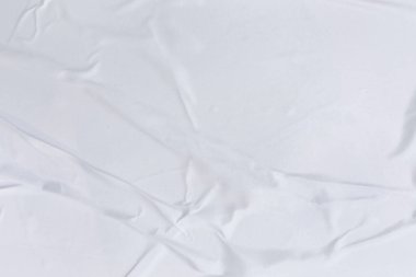 Boş beyaz kağıt buruşmuş doku arka planıdır. Çeşitli amaçlar için buruşmuş kağıt dokusu altyapısı