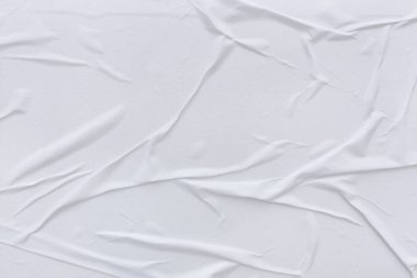 Boş beyaz kağıt buruşmuş doku arka planıdır. Çeşitli amaçlar için buruşmuş kağıt dokusu altyapısı