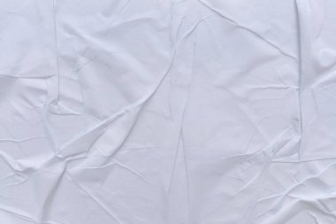 Boş beyaz kağıt buruşmuş doku arka planıdır. Çeşitli amaçlar için buruşmuş kağıt dokusu altyapısı