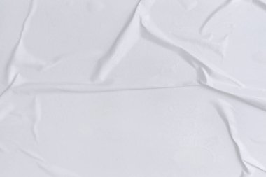 Boş beyaz kağıt buruşmuş doku arka planıdır. Çeşitli amaçlar için buruşmuş kağıt dokusu altyapısı