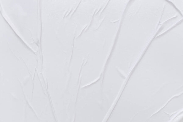 Пустая белая бумага - это скомканный текстурный фон. Фон из скомканной бумаги для различных целей