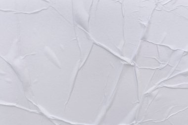 Boş beyaz kağıt buruşmuş doku arka planıdır. Çeşitli amaçlar için buruşmuş kağıt dokusu altyapısı