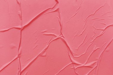 Boş kırmızı kağıt buruşmuş doku arkaplanıdır. Çeşitli amaçlar için buruşmuş kağıt dokusu altyapısı