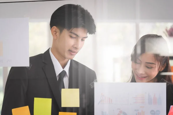 Business man and woman people in formal suit working and brainstorming with colleagues or boss manager in modern workplace office.