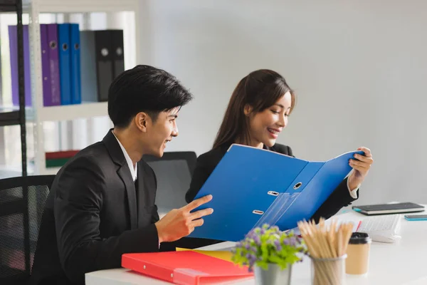 Business man and woman people in formal suit working and brainstorming with colleagues or boss manager in modern workplace office.
