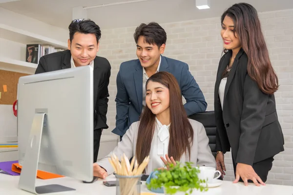 Business Asian people in formal outfit working together and brainstorming in modern office workplace.