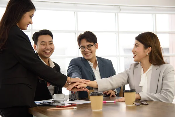Business Asian people in formal suit meeting and working together in modern workspace.