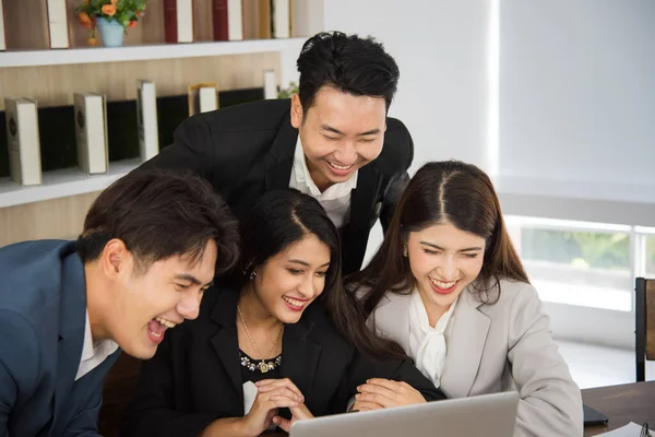 Business Asian people in formal suit meeting and working together in modern workspace.