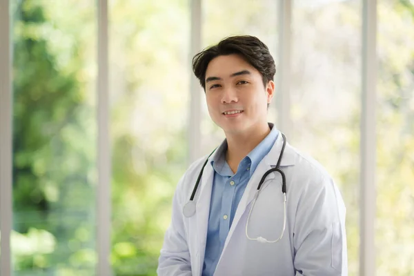 Asian Doctor Man Portrait Professional Uniform Standing Smile Confidence — Zdjęcie stockowe