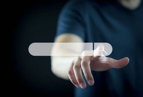 A person using search engine technology touching searching bar virtual screen for browsing and find research information.