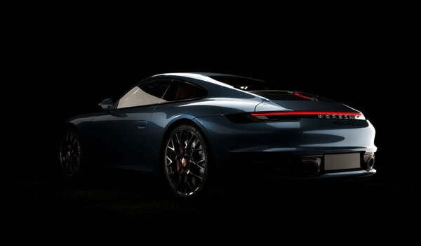 Almaty, Kazahstan - February 12th 2022: Porsche 911 Carrera S expensive cport car beauty shots on the dark background. 3d render