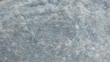 Doğal taşın dokuları ve arkaplanları çarpışıyor.