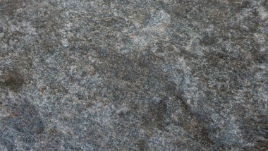 Doğal taşın dokuları ve arkaplanları çarpışıyor.