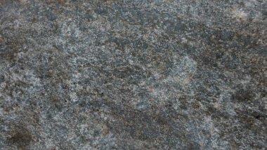 Doğal taşın dokuları ve arkaplanları çarpışıyor.