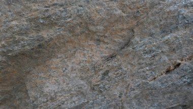 Doğal taşın dokuları ve arkaplanları çarpışıyor.