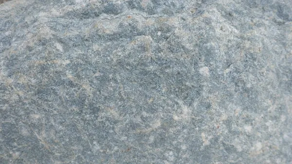 Doğal taşın dokuları ve arkaplanları çarpışıyor.