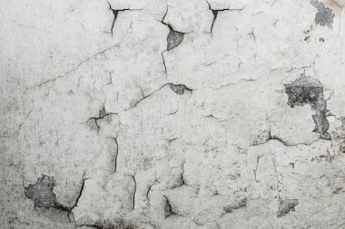 Arka plan sanatı için alçı duvarları soyan eski boya.