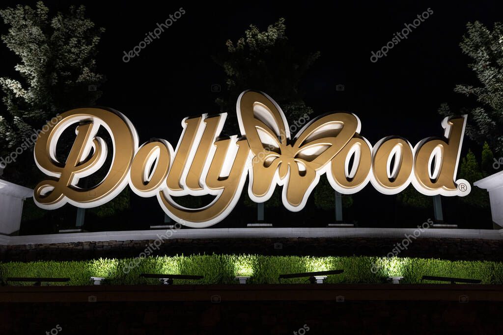 PIGEON FORGE, TN, USA - AUGUST 1, 2022: The entrance to Dollywood with the amusement park logo. Dollywood is Dolly Parton's famous amusement park located in the Smoky Mountains.
