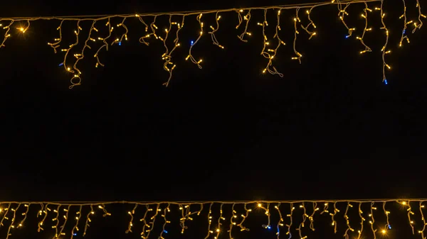 Luzes Natal Guirlanda Fronteira Sobre Fundo Preto Flat Lay Espaço — Fotografia de Stock