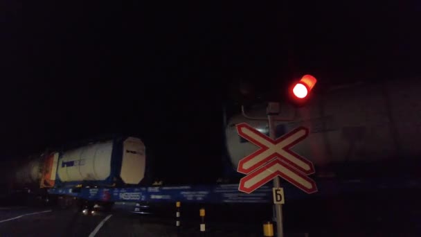 Public Train Passes Roadway Level Crossing Night Time Long Freight — Stock Video