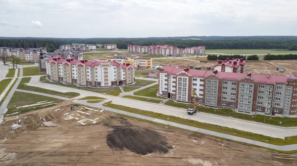 New residential area in small town. Aerial view. Condominium concept.