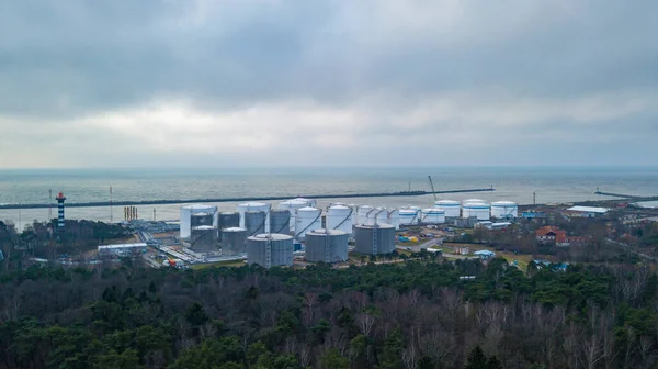 Aerial view white oil tank, storage of oil and petrochemical products ready for logistic and transport business
