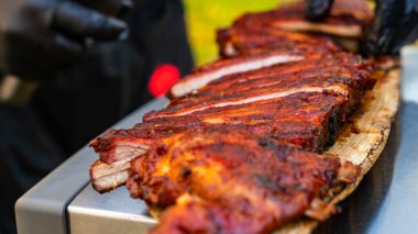 Grilled ribeye steak of marble beef closeup with spices on a wooden Board. Top view.