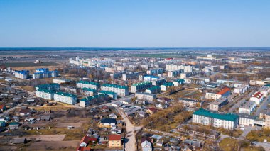 Aerial view over the rural landscape. Small village and nature background.
