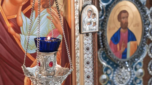 Orthodox Church Lamp Lit Candle Blue Glass Icon Background —  Fotos de Stock