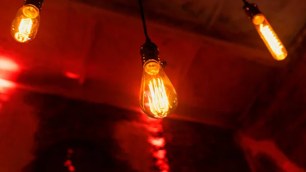Beautiful Yellow Incandescent Bulbs Background Dark Red Red Brick Wall — Stock Photo, Image
