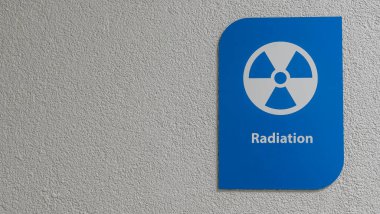 Radyasyon tehlikesi işareti. Bir klinikte röntgen odası. Mesaj için yer var. Radyasyonun etkileri hakkında uyarı. Tıbbi desenli.