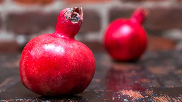 Whole Two Red Pomegranates Wooden Table Background Fresh Raw Organic — Stock Photo, Image