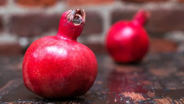 Whole Two Red Pomegranates Wooden Table Background Fresh Raw Organic — Stock Photo, Image