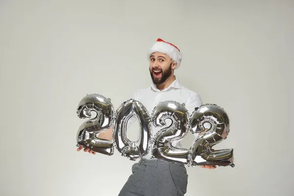 Hombre Encantado Con Cabeza Sombrero Terciopelo Rojo Santa Muestra Globos —  Fotos de Stock