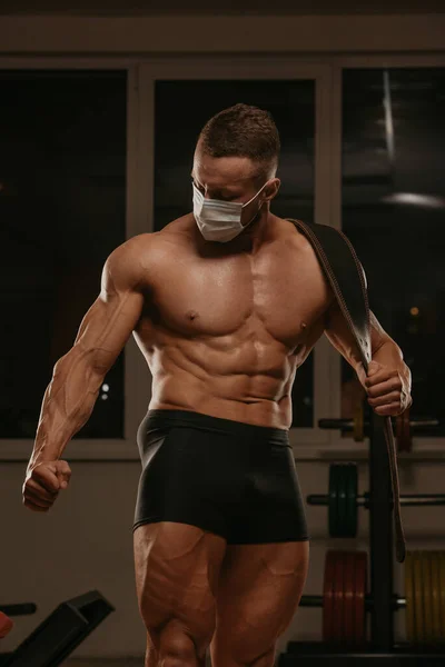 Medium Long Shot Shirtless Bodybuilder Medical Face Mask Who Posing — Stock Photo, Image