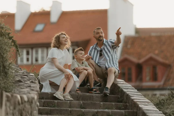 Smiling Family Staring Side Stairs Roofs Old European Town Happy — Photo