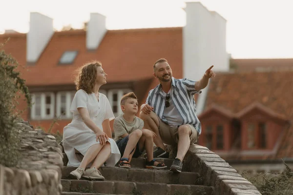 Family Discussing Stairs Roofs Old European Town Happy Father Mother — Stok fotoğraf