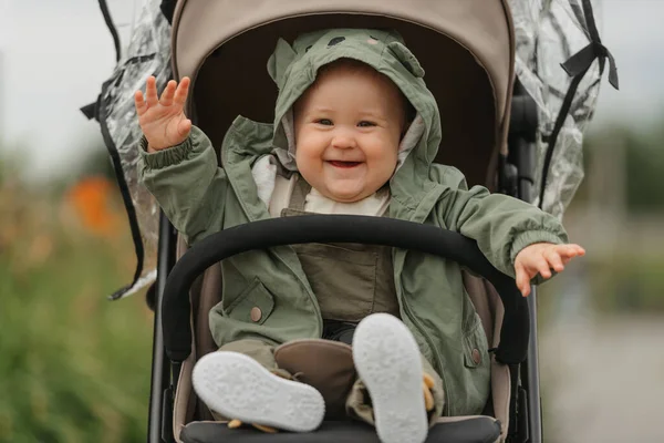 Female Toddler Laughing Her Stroller Cloudy Day Young Girl Rejoices — Φωτογραφία Αρχείου