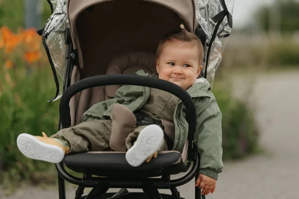 Female Toddler Chilling Stroller Cloudy Day Green Village Young Pretty — Zdjęcie stockowe