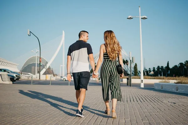 Photo Couple Tourists Walking Modern Urban Space Sunset Valencia Romantic — Fotografia de Stock