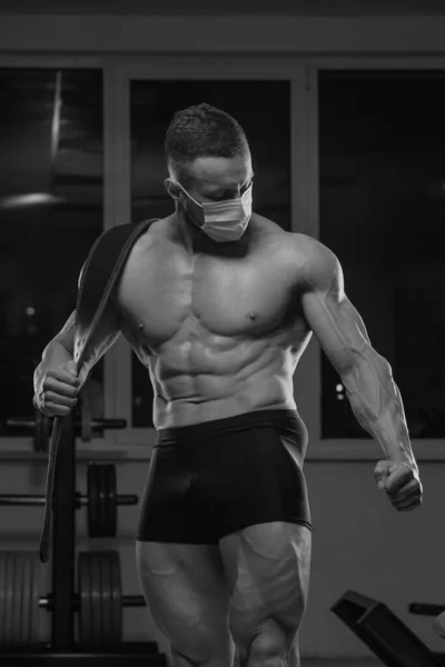 Medium Long Shot Shirtless Bodybuilder Medical Face Mask Who Posing — Stock Photo, Image