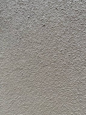 Arkaplan olarak gri desenli beton duvar