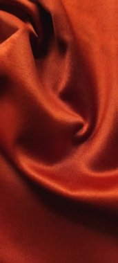 Güzel kumaşlı kırmızı-kahverengi kumaş. Arttır. Yüksek kalite.