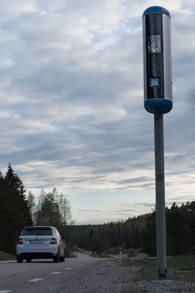 Swedish speed camera with passing traffic