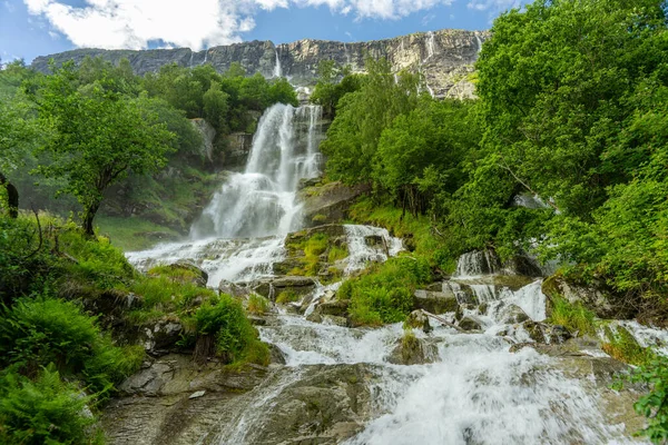 Vinnufossen, a beautiful waterfall flushing down a mountainside in Sunndal,  Norway. The tallest waterfall in Europe and the sixth tallest in the world