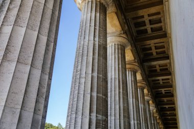 Donaustauf, Bavaria, Germany, 2 July 2022: Walhalla memorial with colonnade above Danube river, hall of fame conceived by Ludwig I, inside busts of politicians, scientists and artists of German tongue