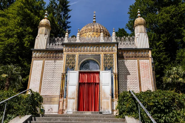 Linderhof Palace, Ettal, Bavaria, Germany, 3 July 2022: Schloss or chateau at rococo style surrounded by gardens and parks, castle built by King Ludwig II based on Versailles, Moorish Kiosk at summer
