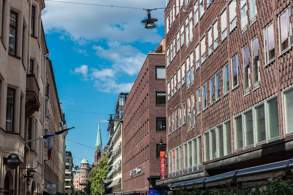 Stockholm, Sweden - 07 24 2019: facades of a typical scandinavian shopping street