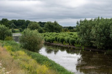 View over the natural floodplain with agriculture field and wetland around Ochten, The Netherlands